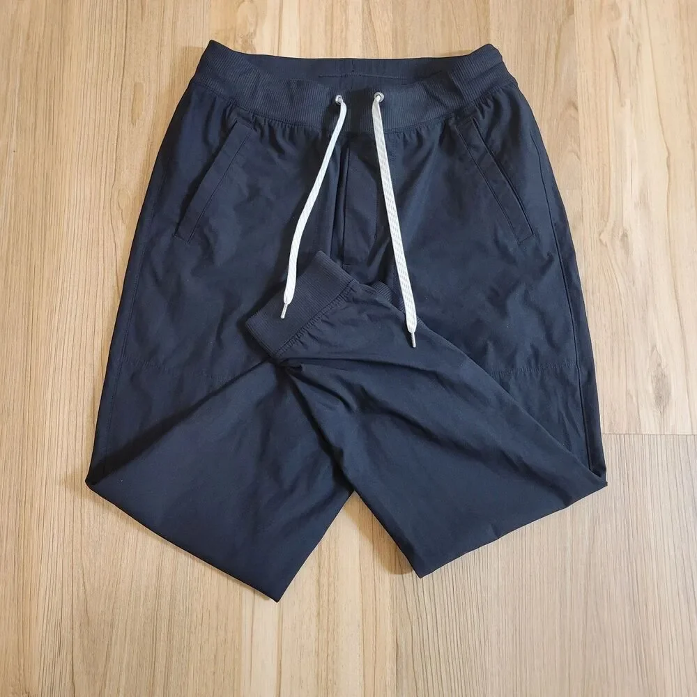 Vuori Meta Jogger Men Medium Black Drawstring Stretch Performance Pants V436
